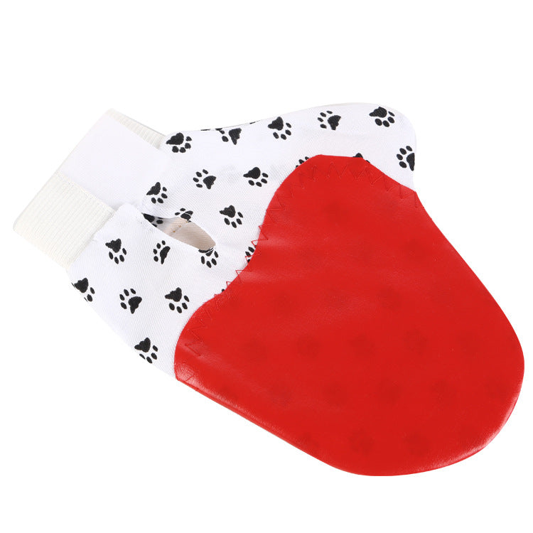 Pet Deshedding Grooming Gloves — red silicone grooming mitt with white paw-print cuff on white background