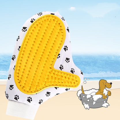Pet Deshedding Grooming Gloves — close-up of the yellow silicone-tipped palm of the grooming mitt