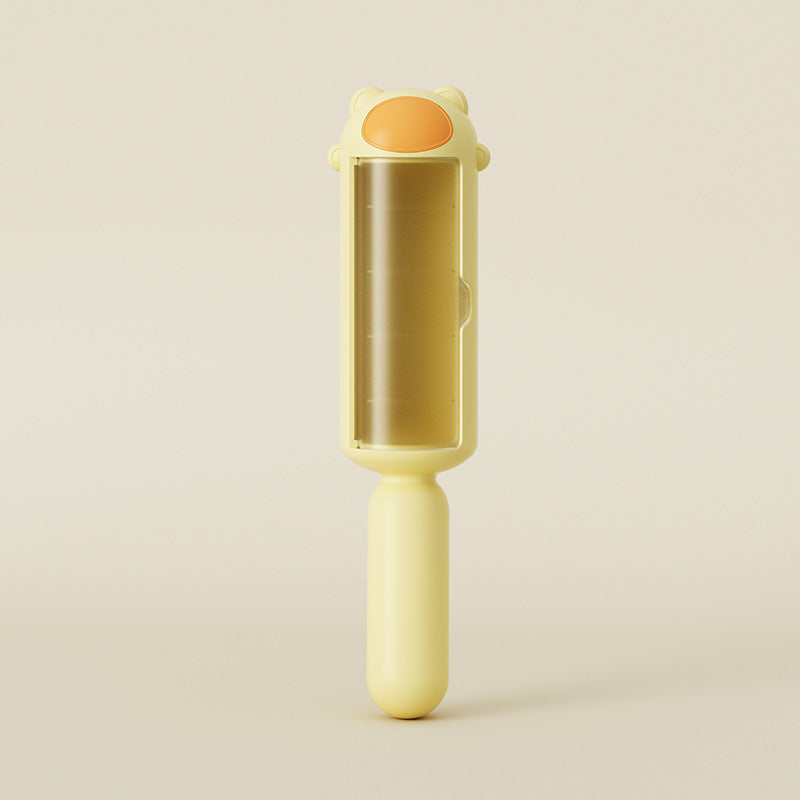 Reusable Pet Hair Remover Roller — yellow roller with bear-ear design and transparent collection chamber