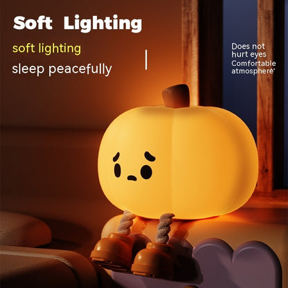 Halloween Pumpkin Silicone Night Light — glowing pumpkin with cute sad face, advertising soft lighting for peaceful sleep that does not hurt eyes