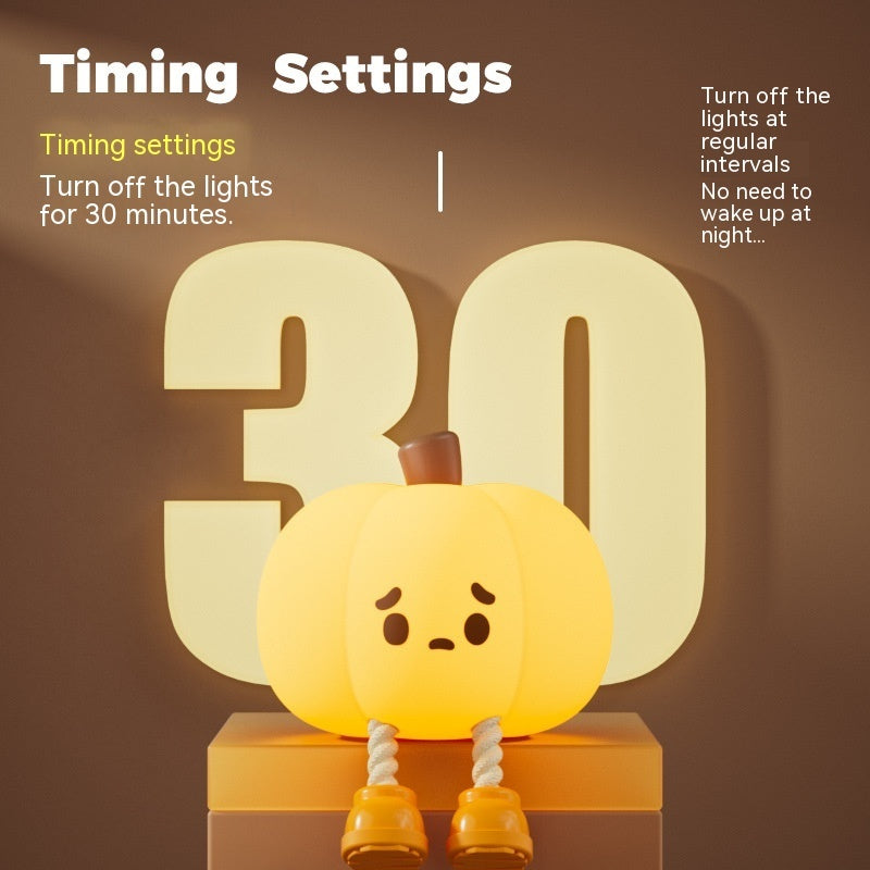 Halloween Pumpkin Silicone Night Light — glowing pumpkin with cute sad face advertising 30-minute timing setting that turns off the lights at regular intervals